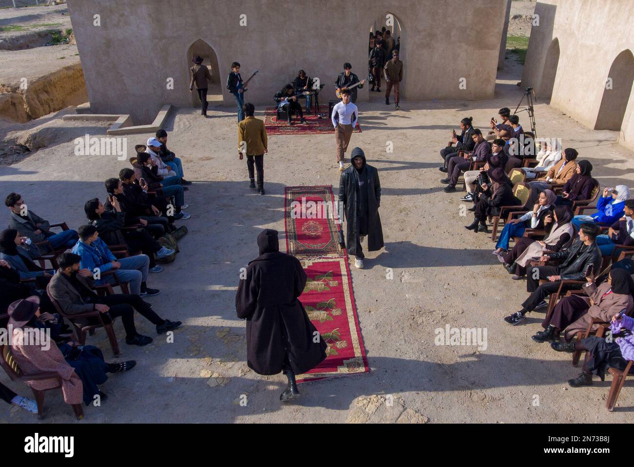 Iraqi models wear second-hand clothes during fashion show to raise