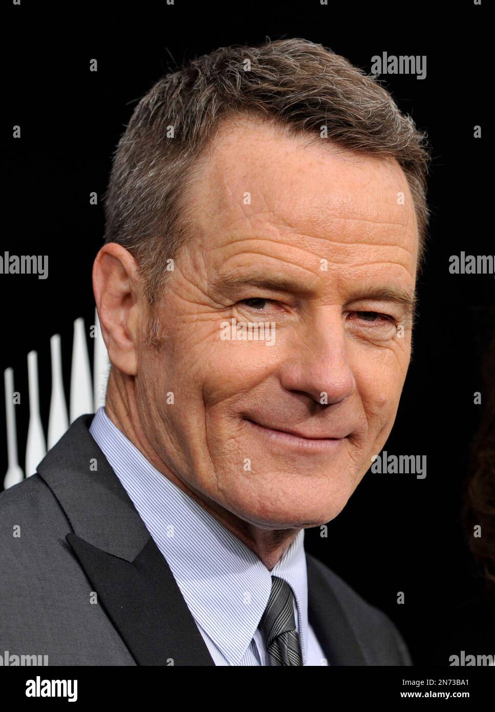 Bryan Cranston, left, a cast member in "Breaking Bad," poses at a ...