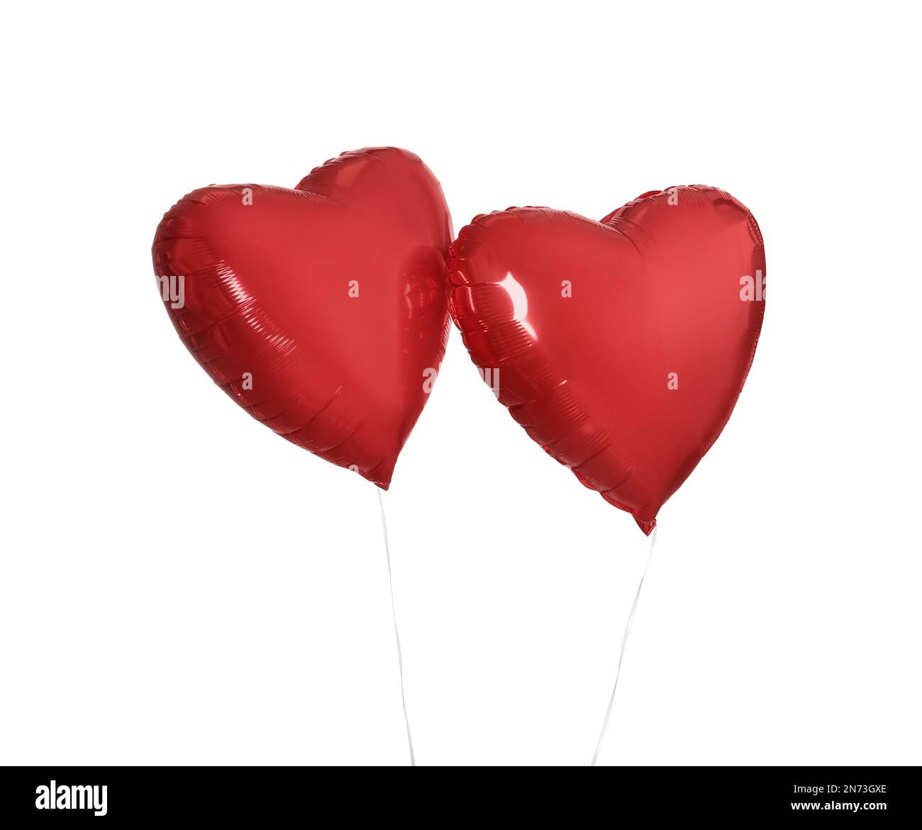 Red heart shaped balloons isolated on white. Valentine's Day ...