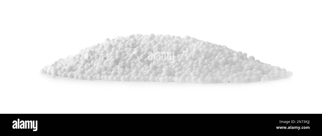 Pellets of ammonium nitrate on light grey background. Mineral fertilizer Stock Photo