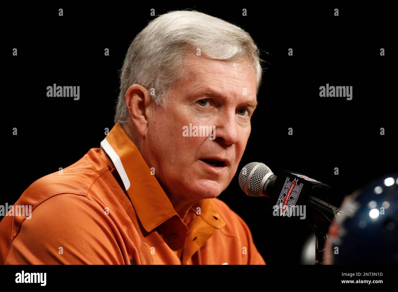 Texas football coach Mack Brown addresses the media during the NCAA college Big 12 Conference Football Media Days Tuesday, July 23, 2013 in Dallas. (AP Photo/Tim Sharp) Stock Photo