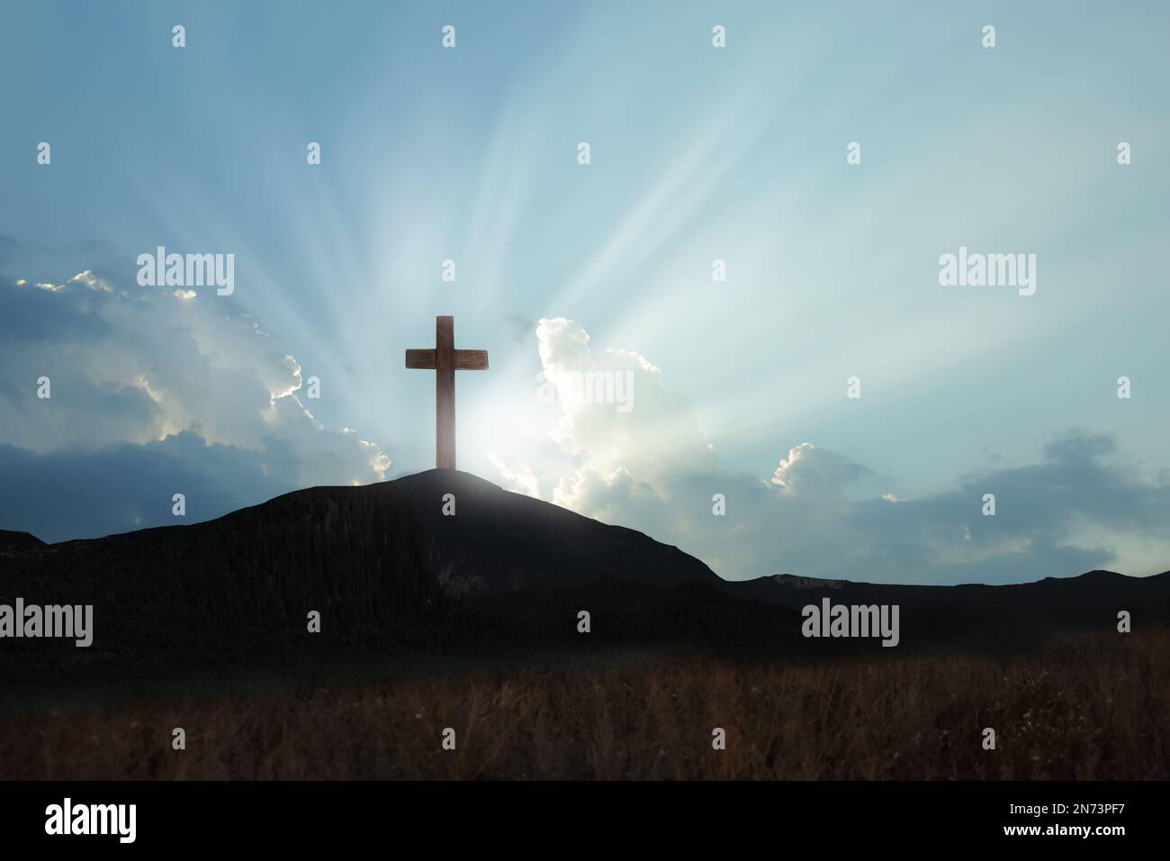 Christian cross on hill outdoors at sunrise. Resurrection of Jesus ...