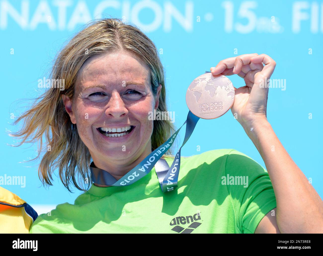 Germany's Angela Alexandra Maurer holds up her bronze medal following