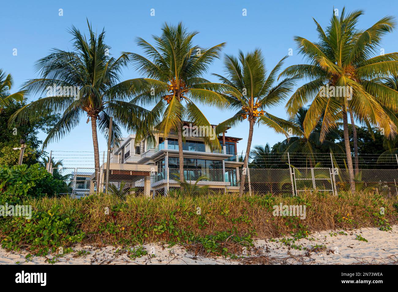 Some houses at the beach of flic en flac at mauritius island, africa Stock Photo
