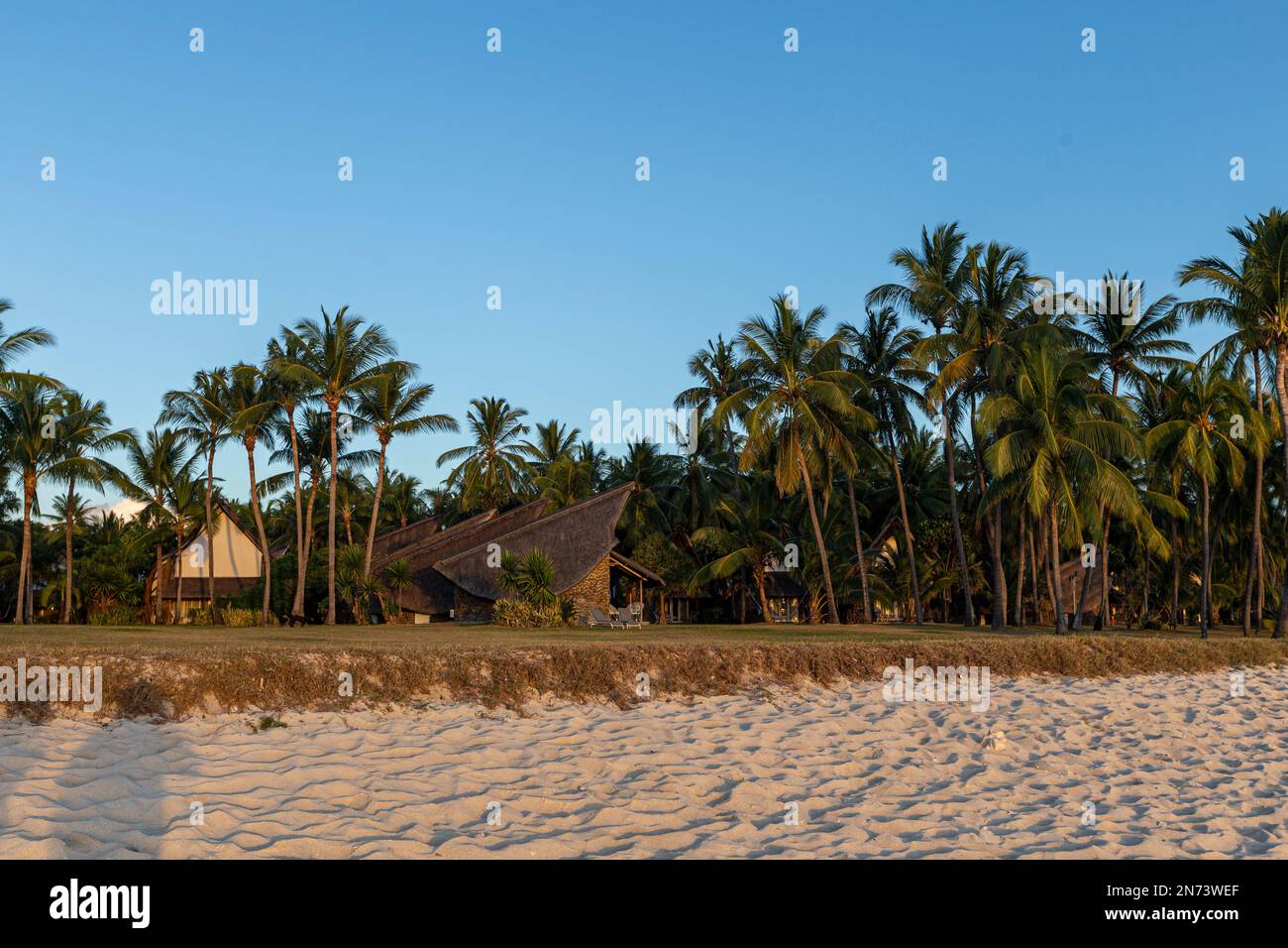 Some houses at the beach of flic en flac at mauritius island, africa Stock Photo