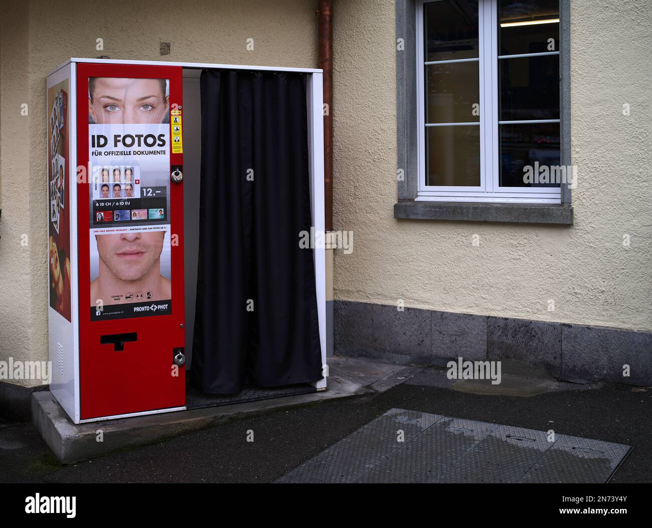 Passport photo booth, Fotofix, for biometric passport photos, Grindelwald, Canton Bern, Switzerland Stock Photo