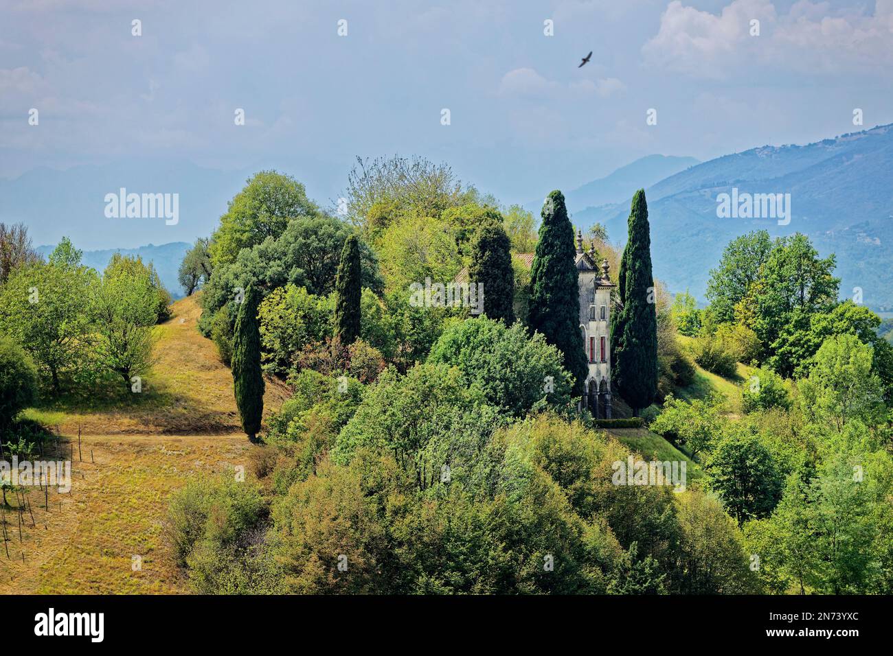 A house hidden among trees on a hill in the northern Italian town of Asolo Stock Photo