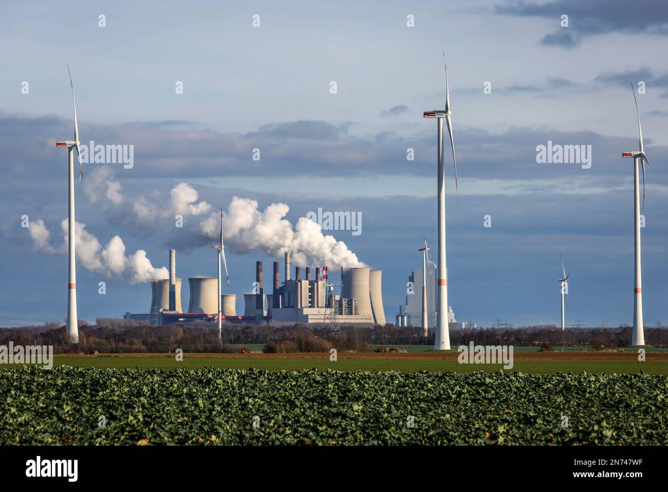 Grevenbroich, North Rhine-Westphalia, Germany - Wind turbines in the wind farm in front of RWE's Neurath power plant at the Garzweiler open pit mine. Stock Photo