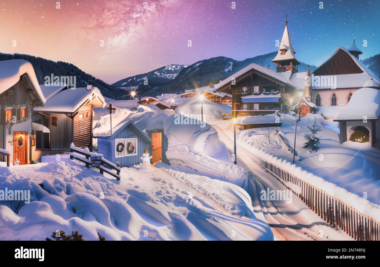 Fairytale village with wooden houses and snow covered roofs hi-res ...