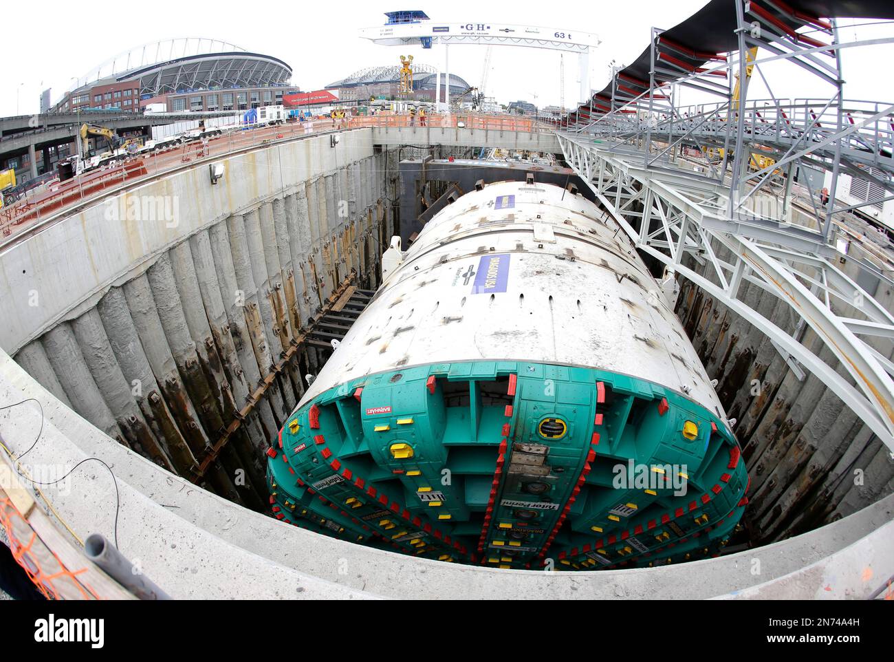 In this photo taken with a fisheye wide-angle lens, “Bertha”—the massive tunnel-boring machine…