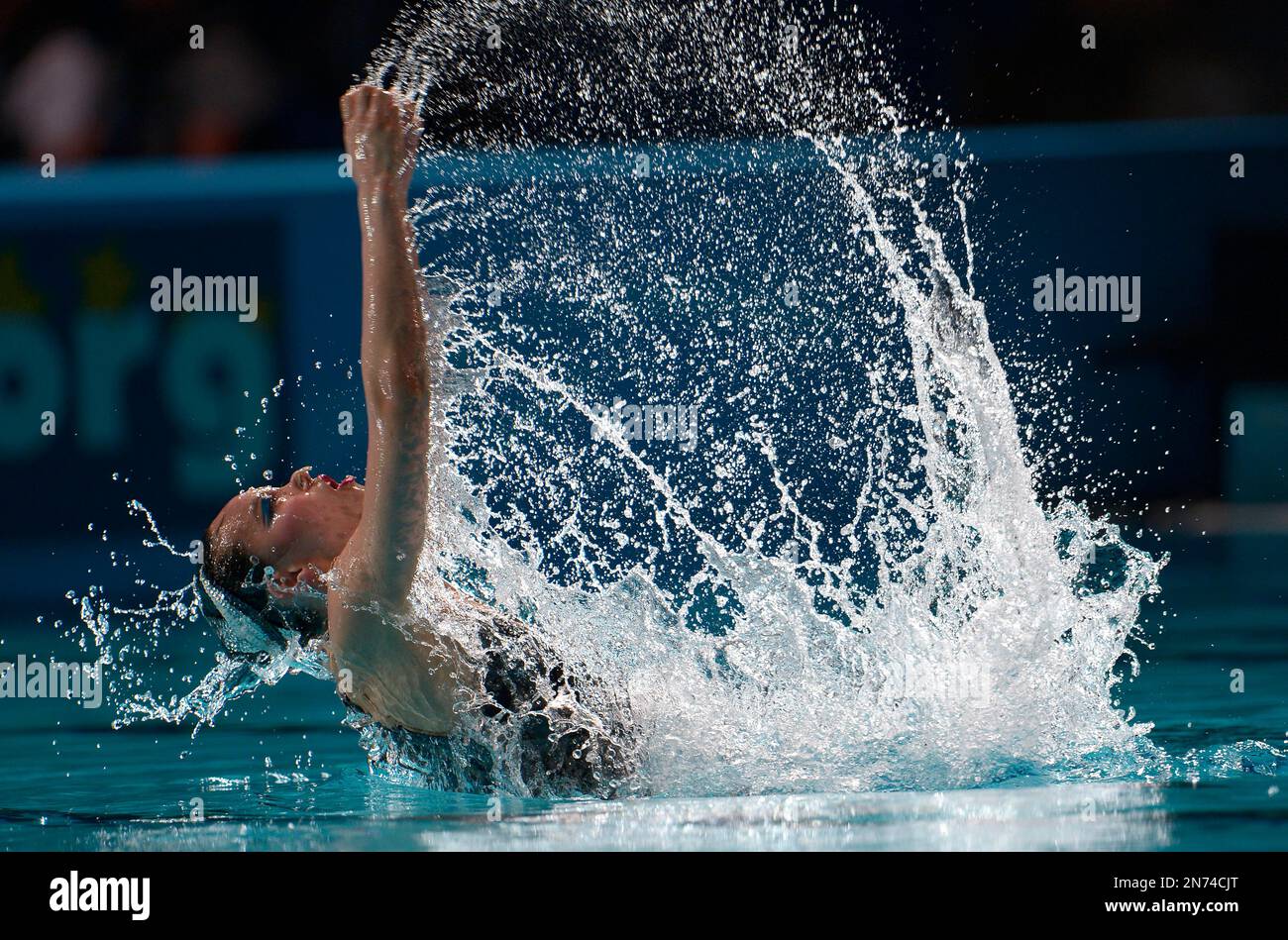 China's Huang Xuechen performs her routine during the synchronised