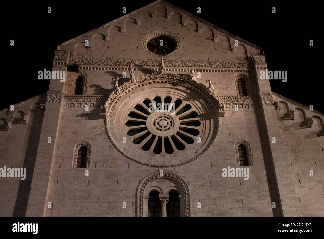 Illuminated cathedral San Sabino in Bari at night, Southern Italy Stock Photo