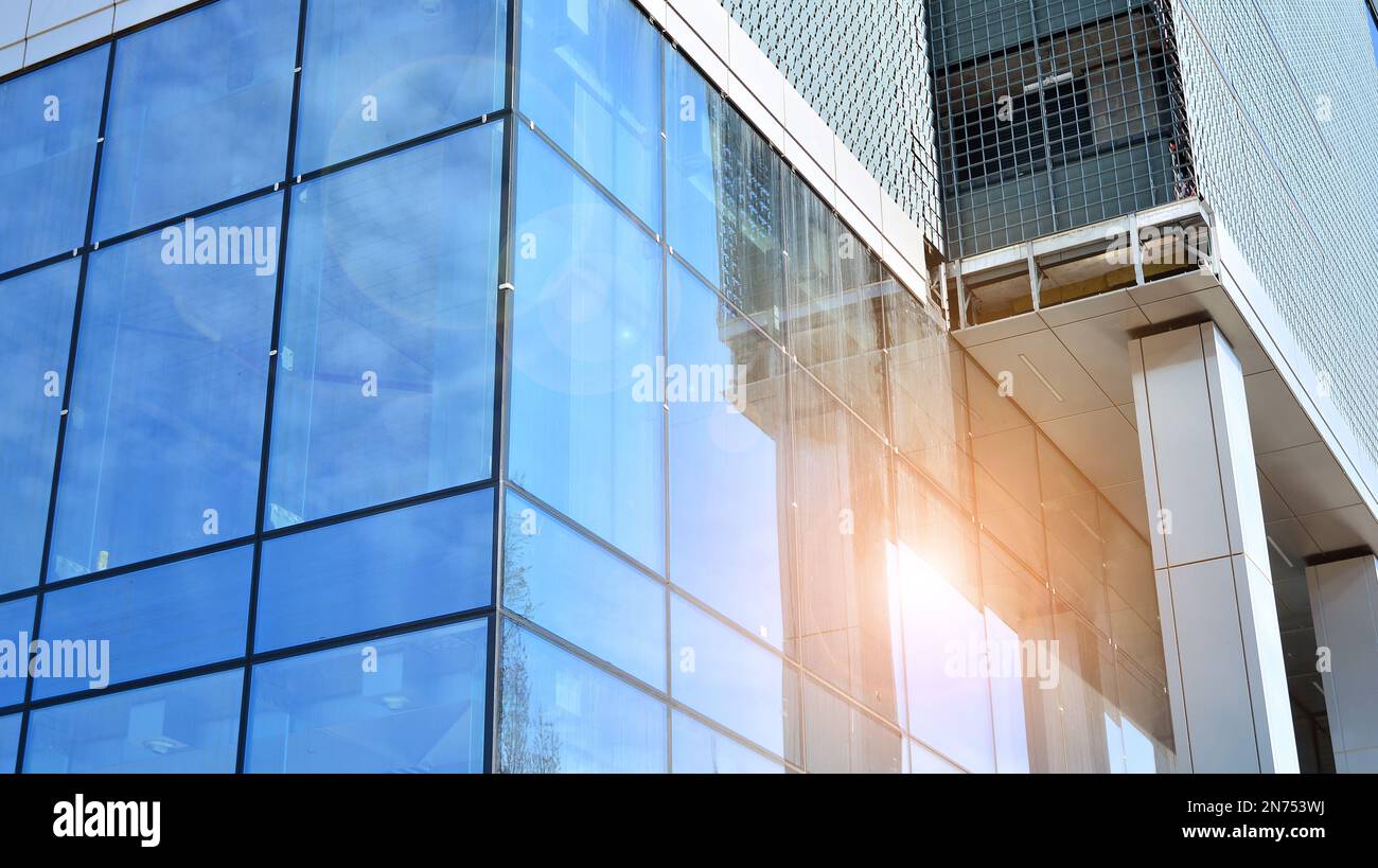 Abstract fragment of contemporary architecture, walls made of glass and
