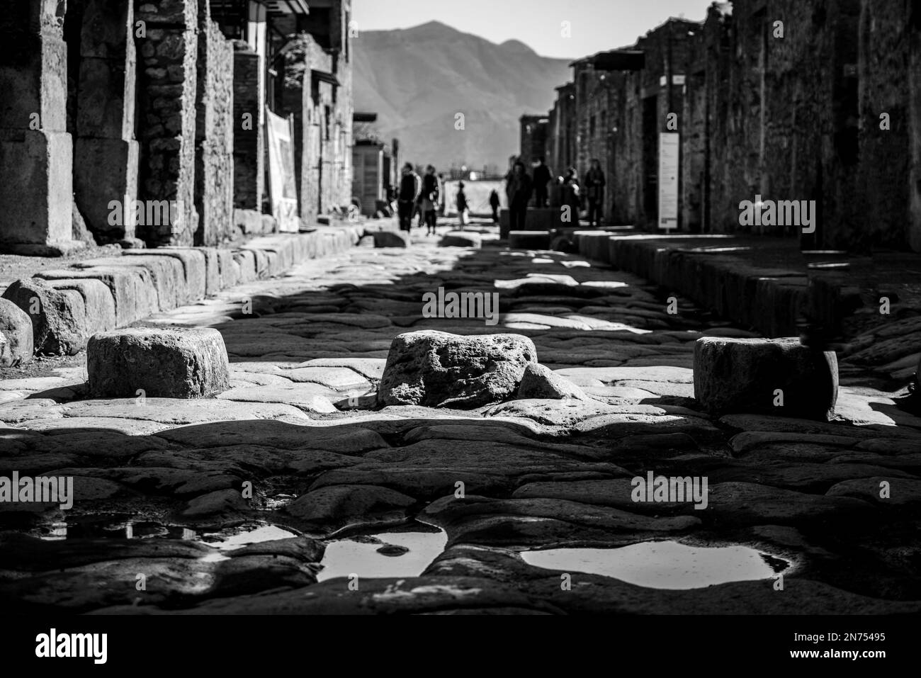 Pompeii, Italy, A crosswalk of a typical Roman road in the ancient city of Pompeii, Southern Italy Stock Photo