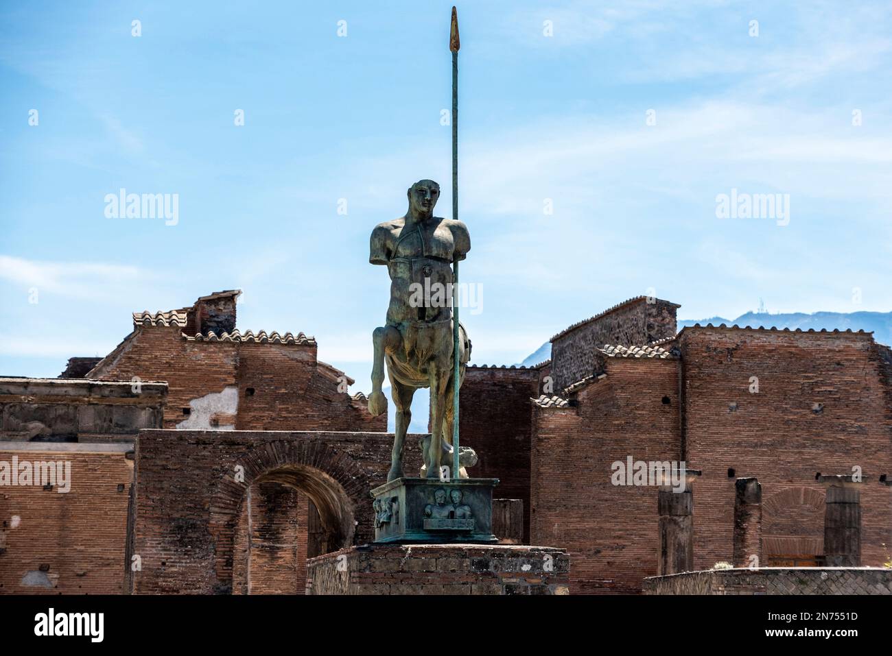 Beautiful statue of an ancient lancer on the forum of the ancient city of Pompeii, Southern Italy Stock Photo