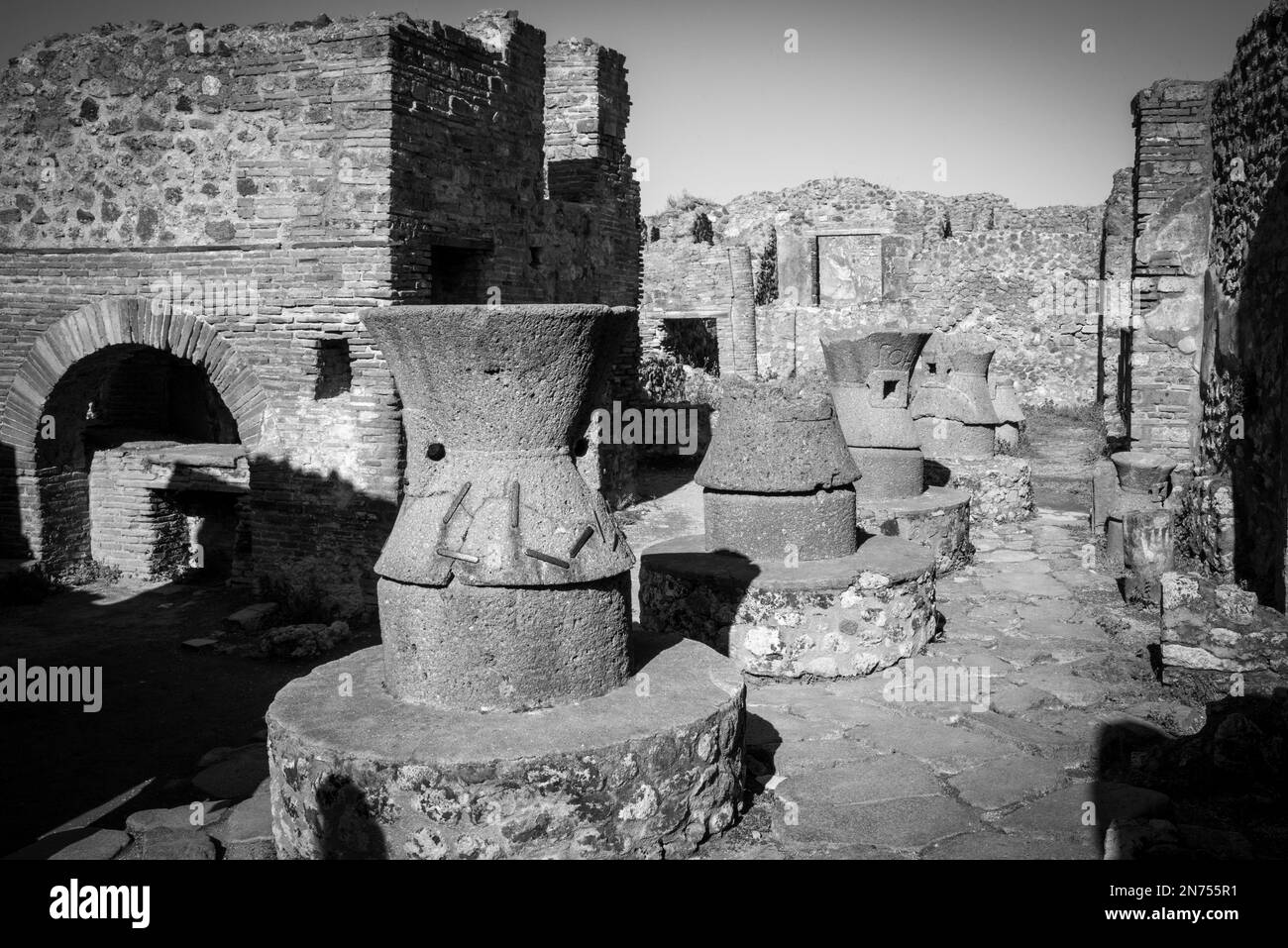 Millstones of a bakery in the ancient city of Pompeii, Italy Stock Photo