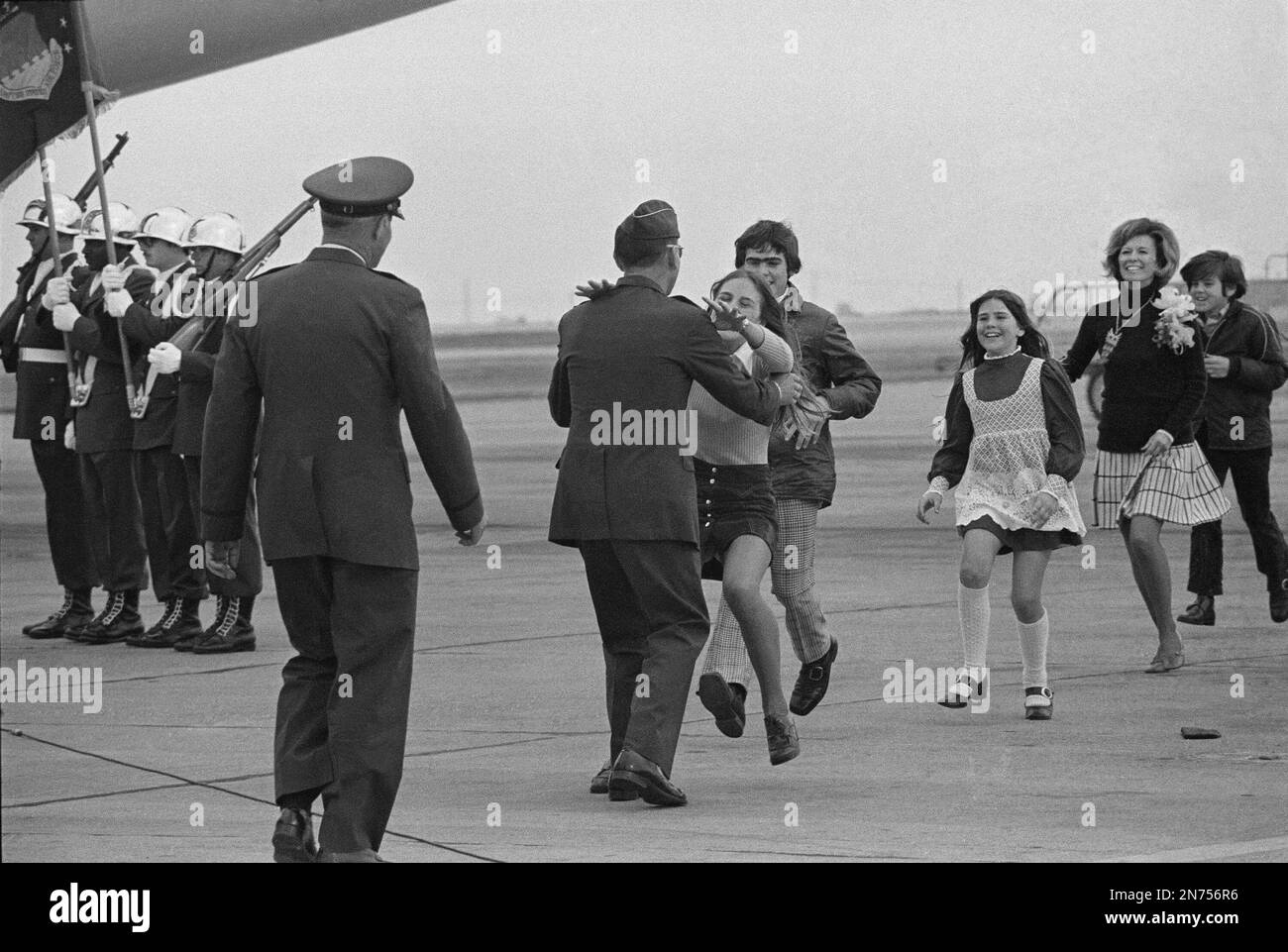 Released prisoner of war Lt. Col. Robert L. Stirm is greeted by his ...