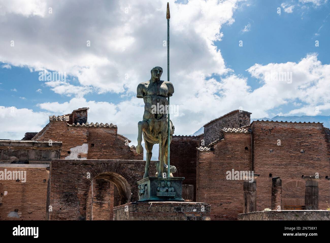 Beautiful statue of an ancient lancer on the forum of the ancient city of Pompeii, Southern Italy Stock Photo