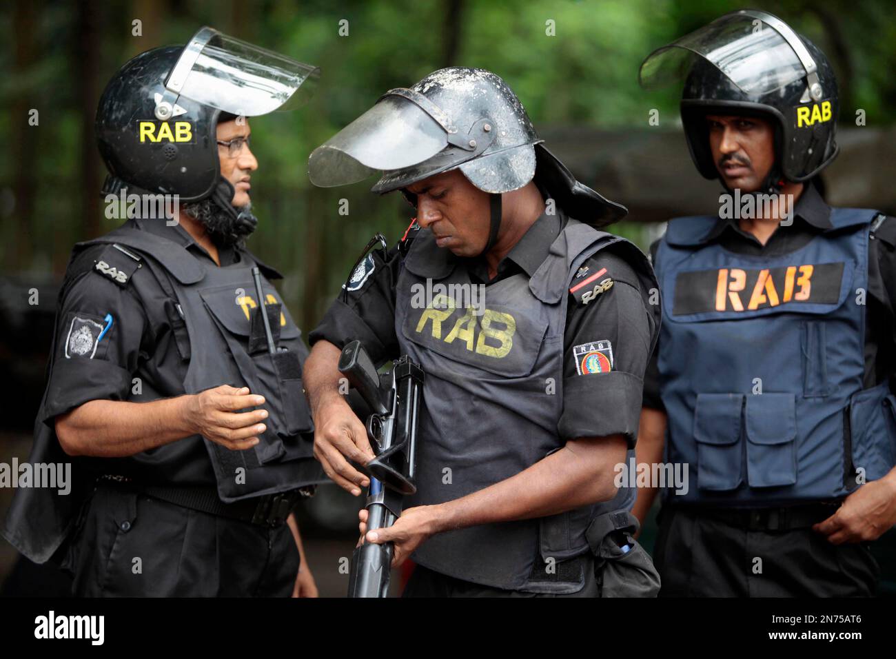Members of Bangladesh's Rapid Action Battalion (RAB) stand in front of