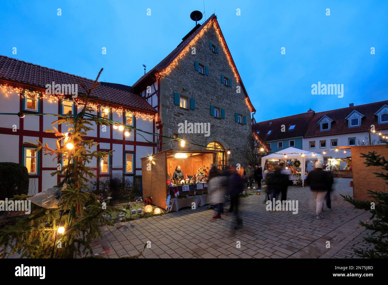 Christmas market, Christkindlmarkt, blue hour, Advent, Stadtlauringen, Haßberge; Lower Franconia; Bavaria; Germany; Stock Photo