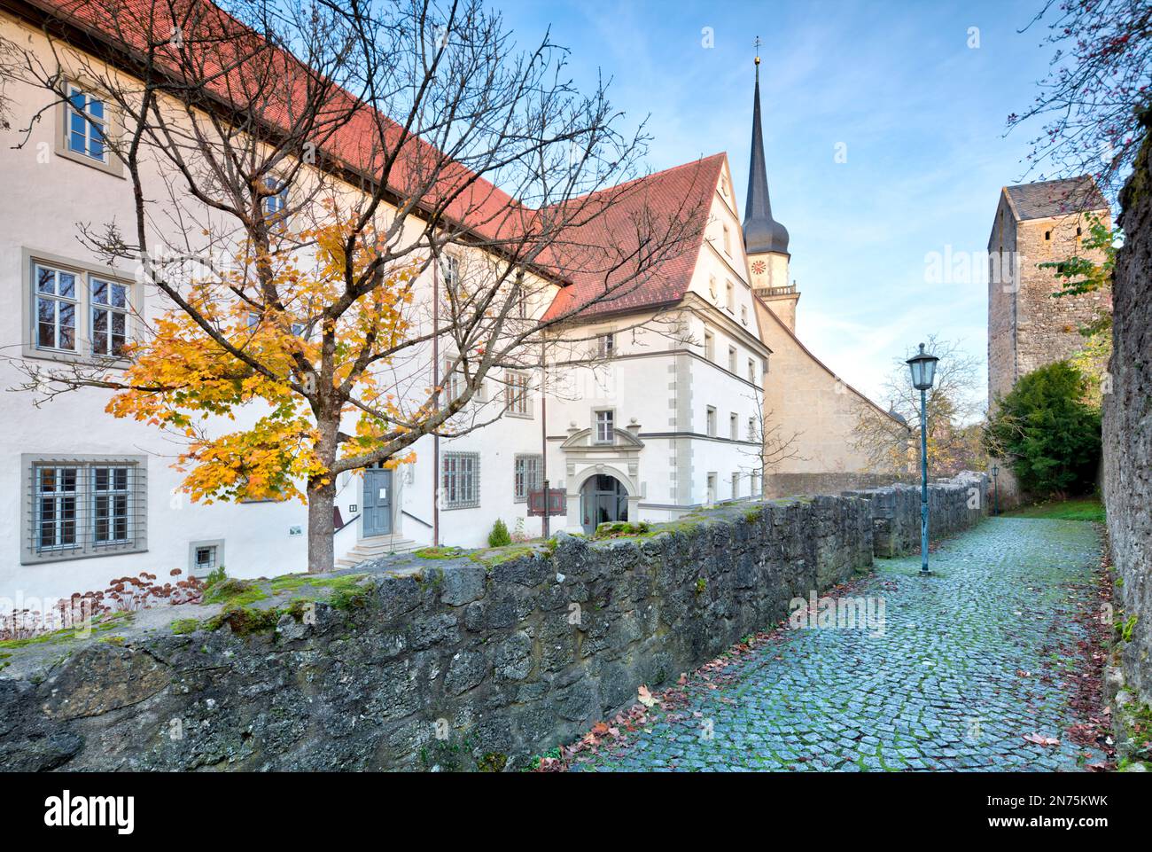 Historic town hall, Catholic church, St. Kilian, Jacob's tower, town wall, house facade, Fladungen, Rhön, Franconia, Bavaria, Germany, Europe Stock Photo
