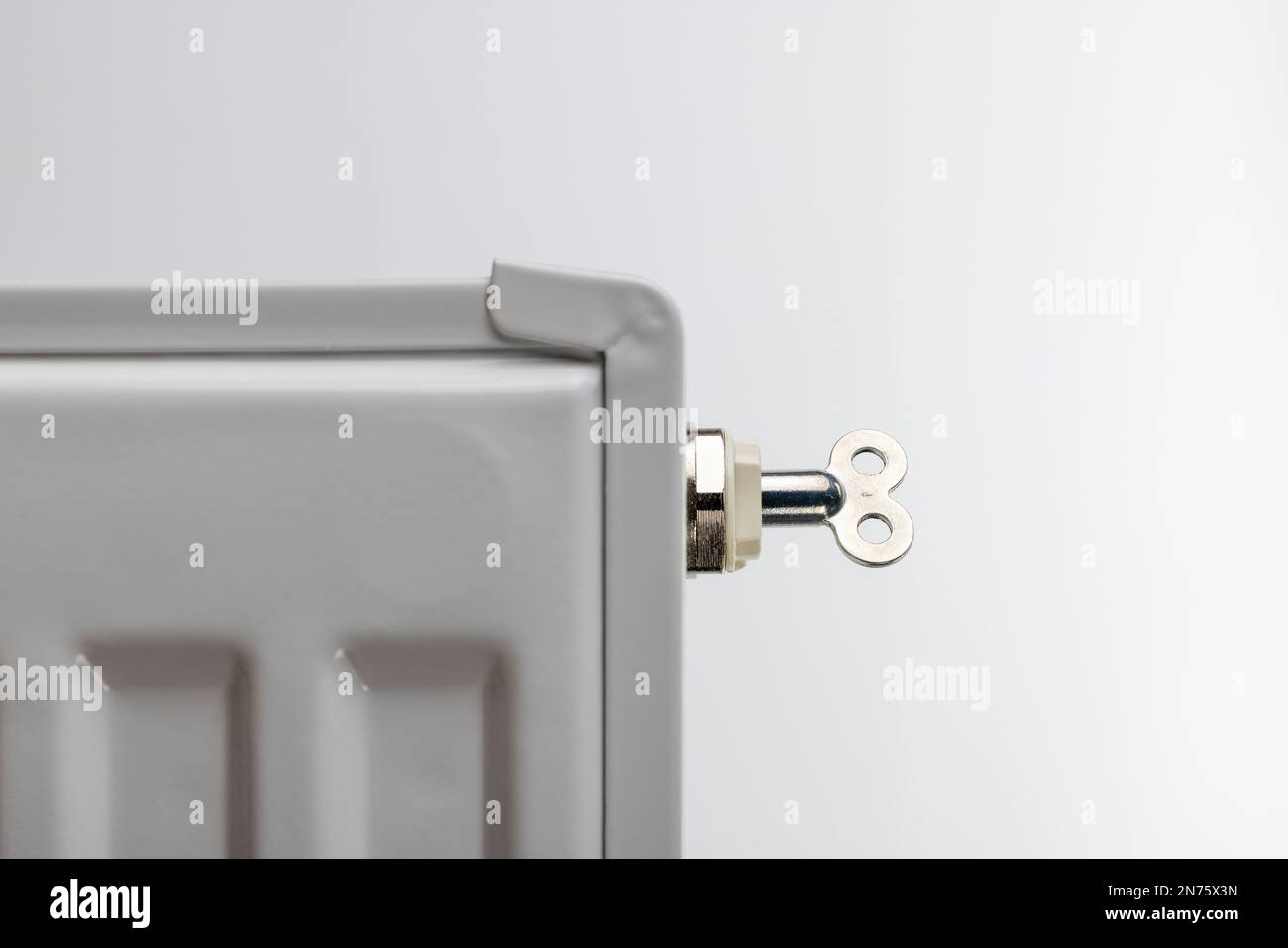 Key for heating vent is stuck in the vent valve on the radiator, symbol