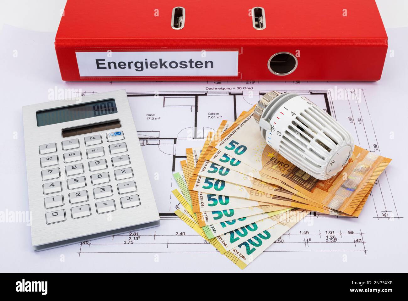 Red file folder labeled energy costs, calculator, euro bills, 800 euros