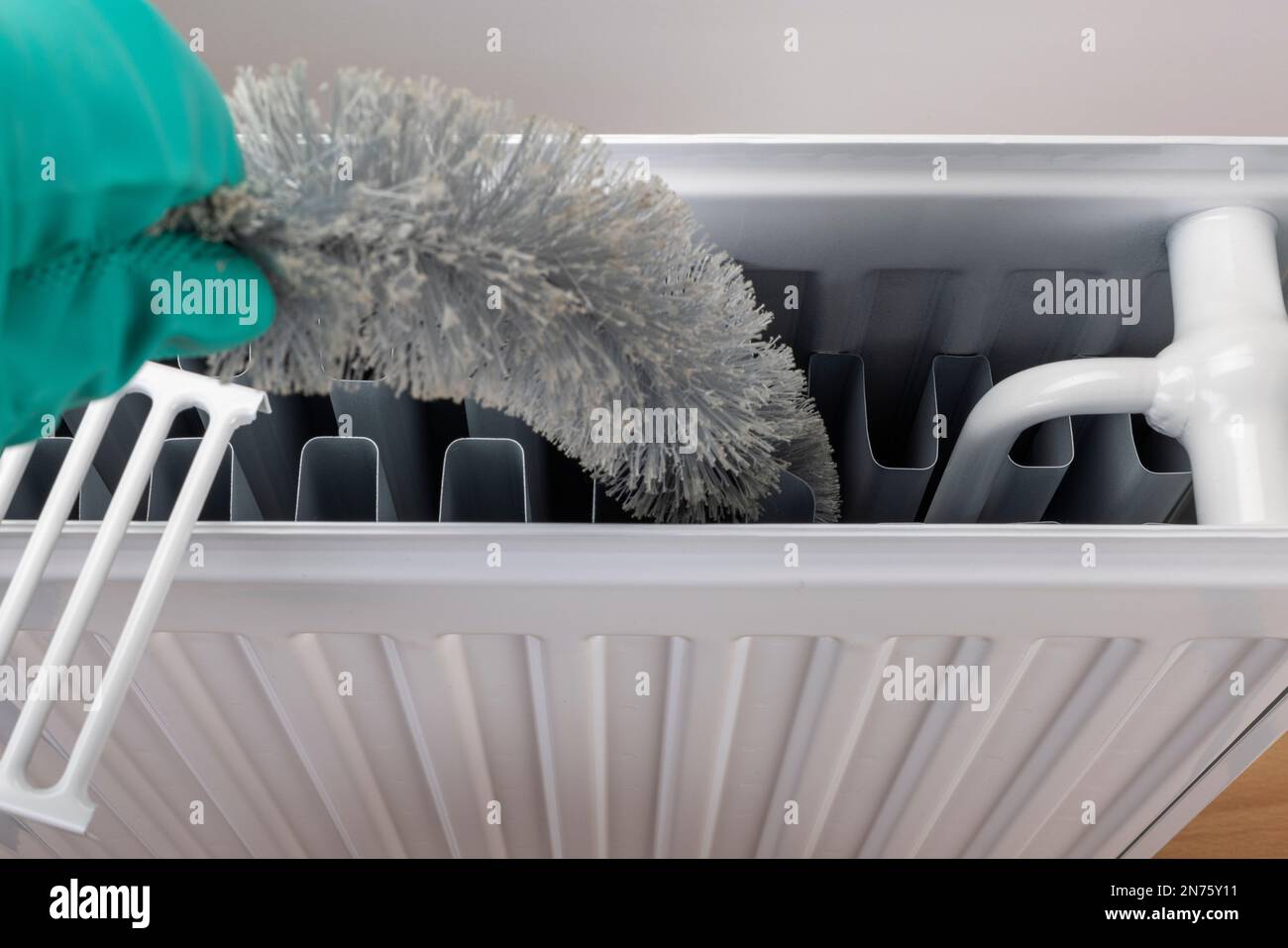 Clean Radiator Inside Clean radiator with radiator brush inside, white background, symbol ...