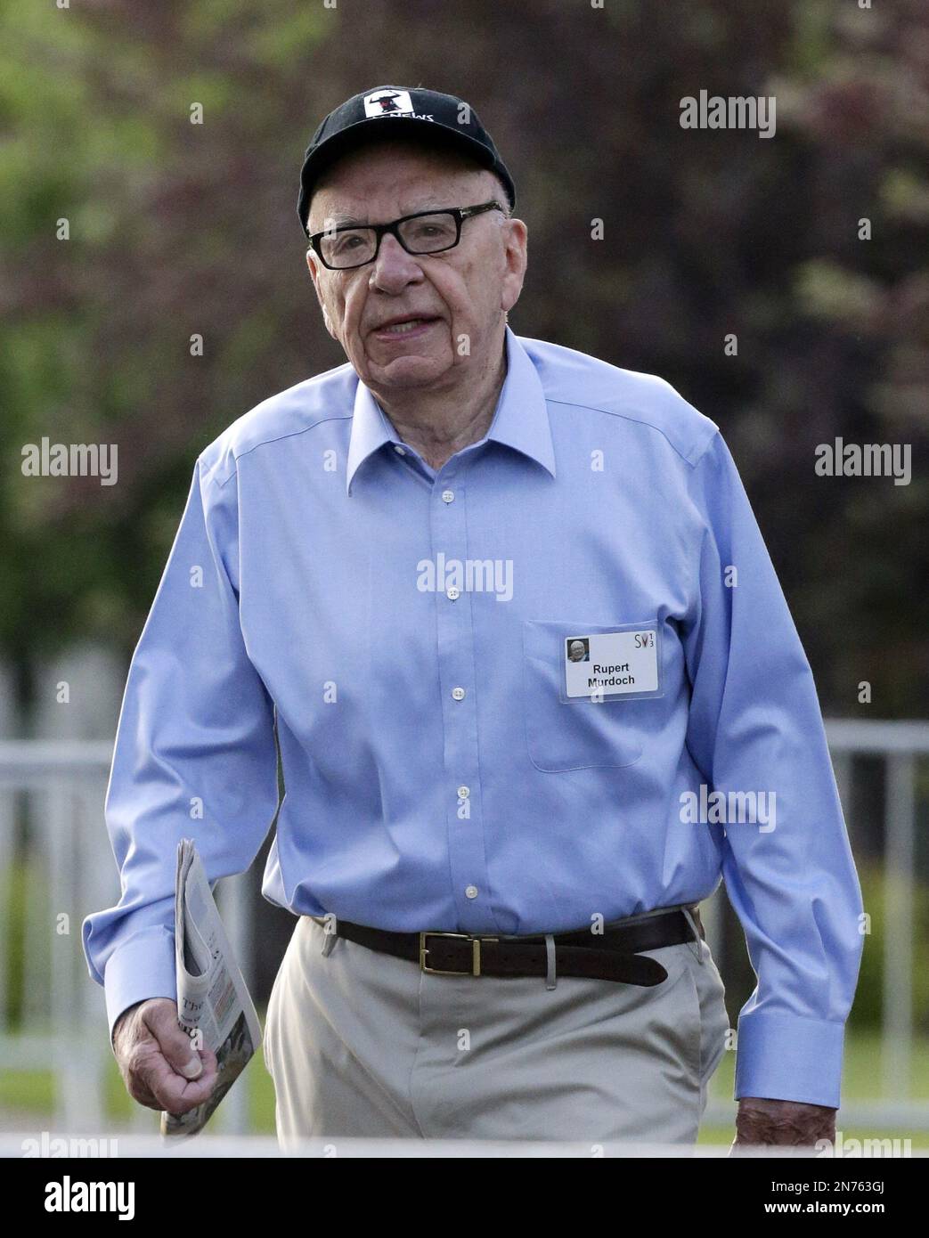 Rupert Murdoch, Chairman and CEO of News Corporation, walks to the