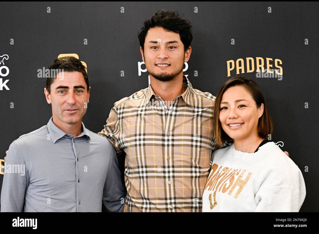 San Diego Padres' Yu Darvish, left, poses for a photo with his wife Seiko  Darvish at a baseball news conference, Friday, Feb. 10, 2023, in San Diego.  Darvish signed a new contract