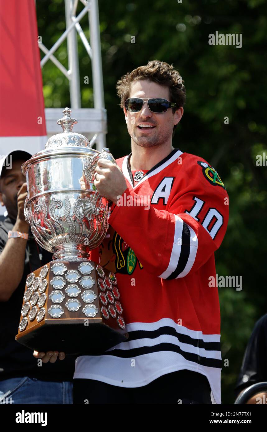 Brandon Saad Chicago Blackhawks Unsigned 2015 Stanley Cup Champions Raising  Cup Photograph, image size:858x1390