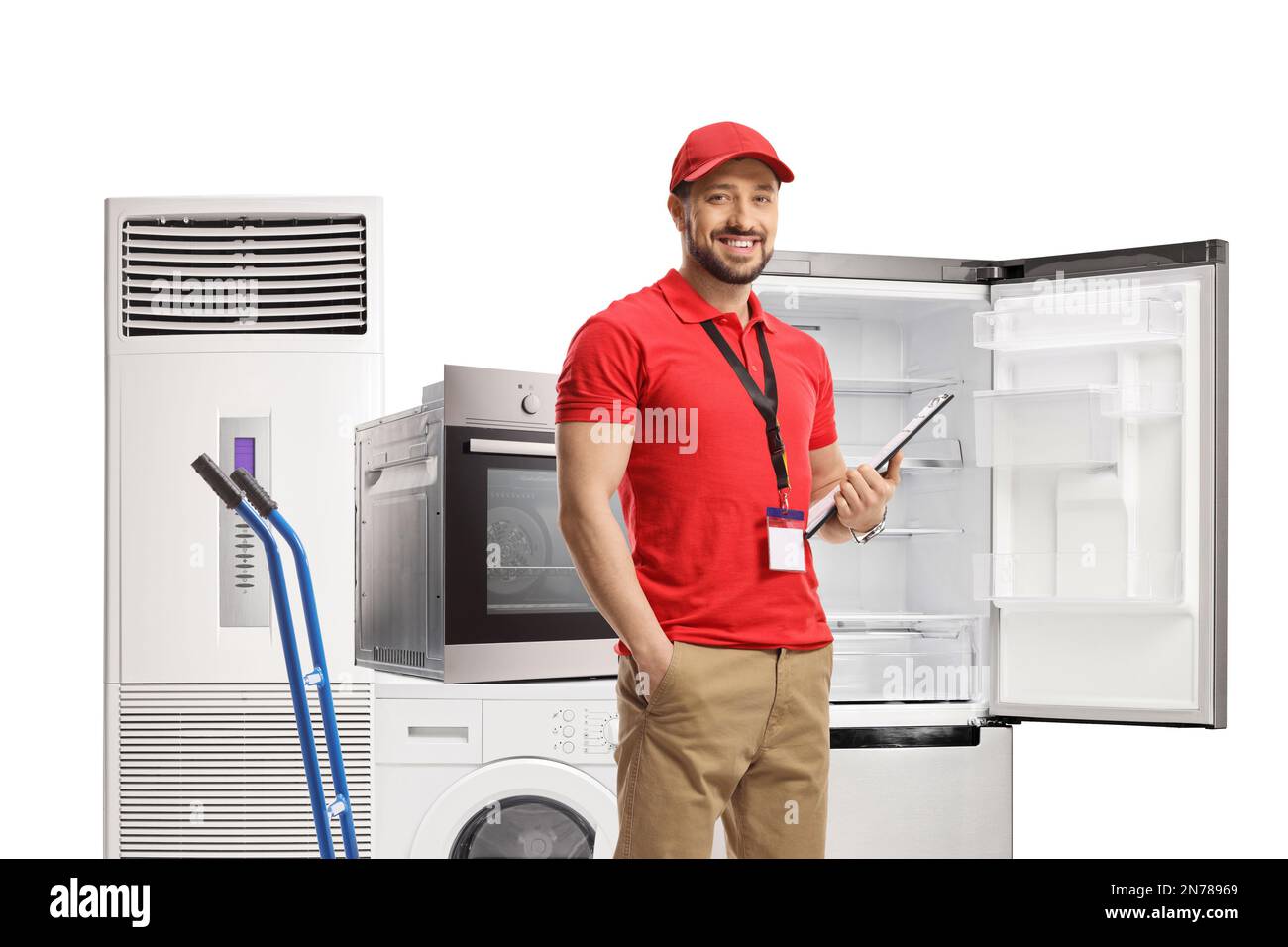 Sales manager posing with domestic electrical appliances isolated on