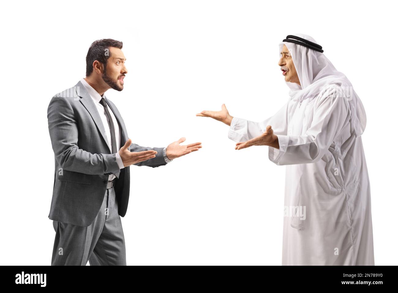 Businessman arguing with a mature arab man isolated on white background Stock Photo