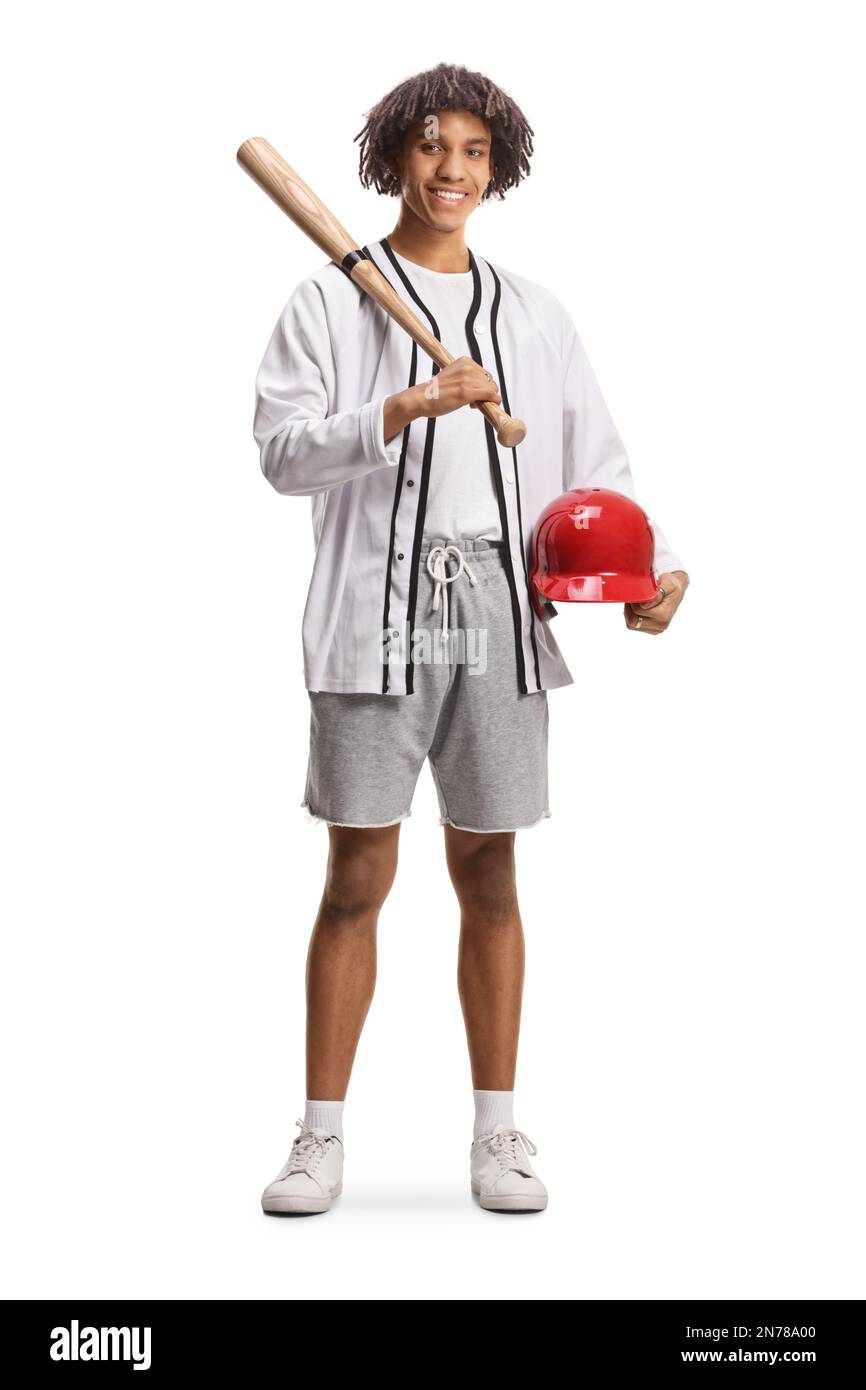 Full length portrait of an african american young man holding a baseball bat and a red helmet isolated on white background Stock Photo