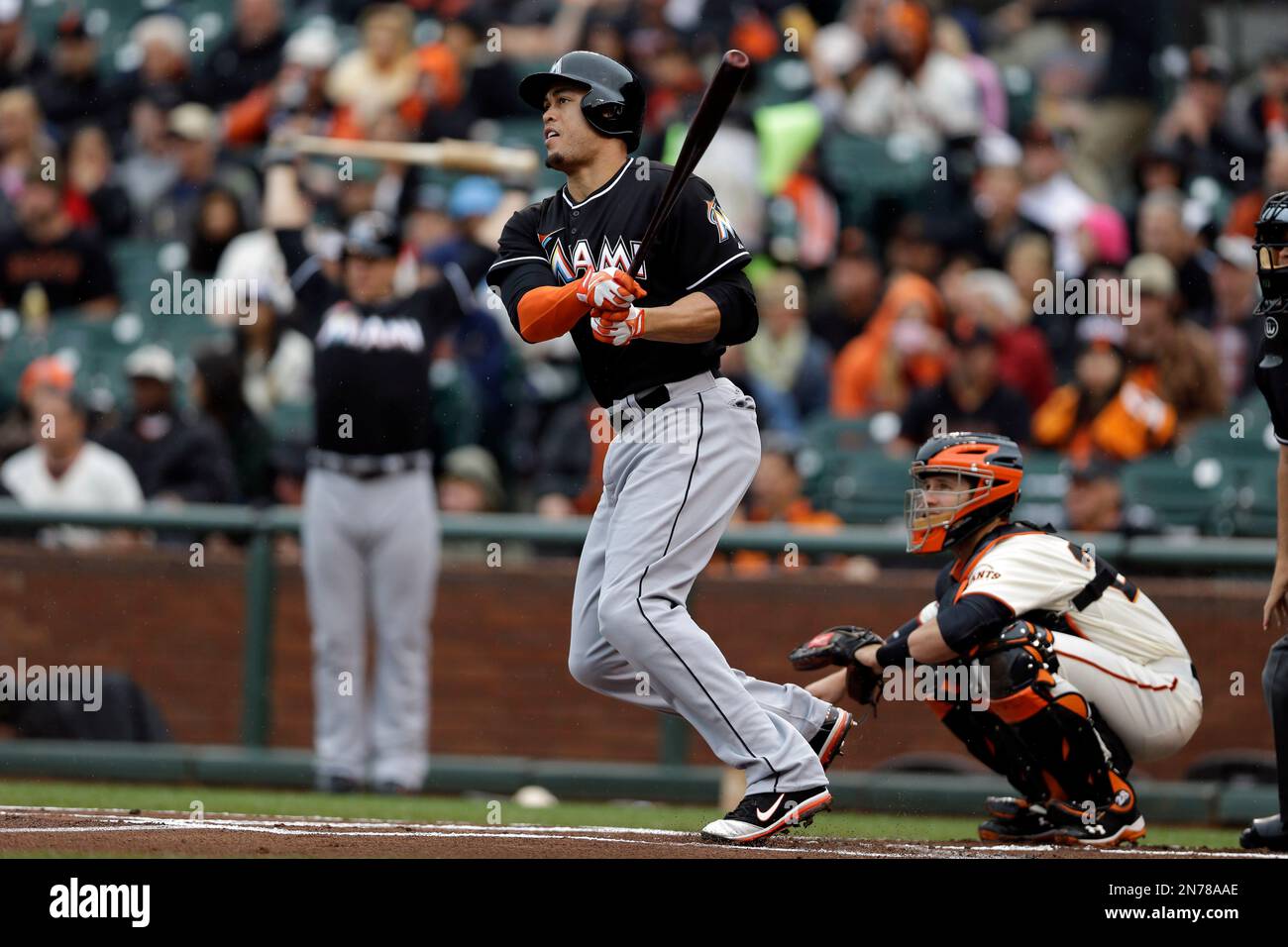 Miami Marlins right fielder Giancarlo Stanton reacts after