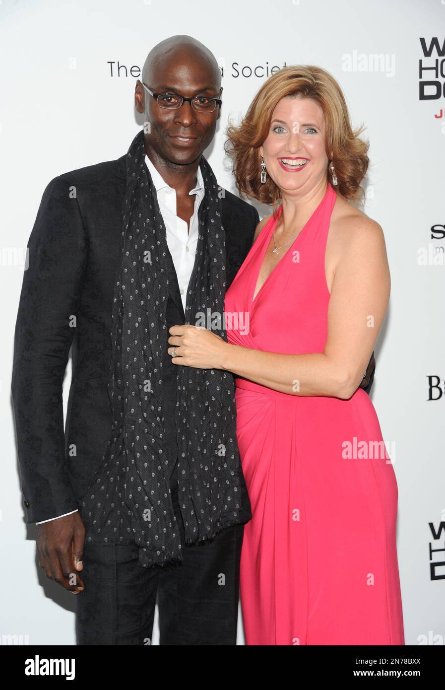 Actor Lance Reddick and wife Stephanie Day attend the "White House Down