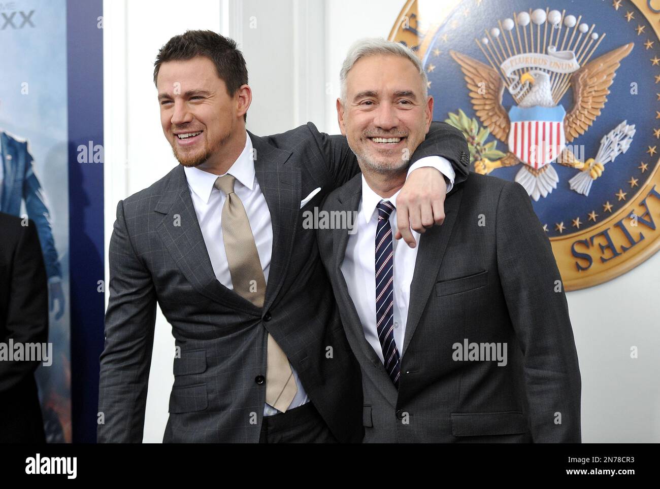 Actor Channing Tatum, left, and director Roland Emmerich attend the