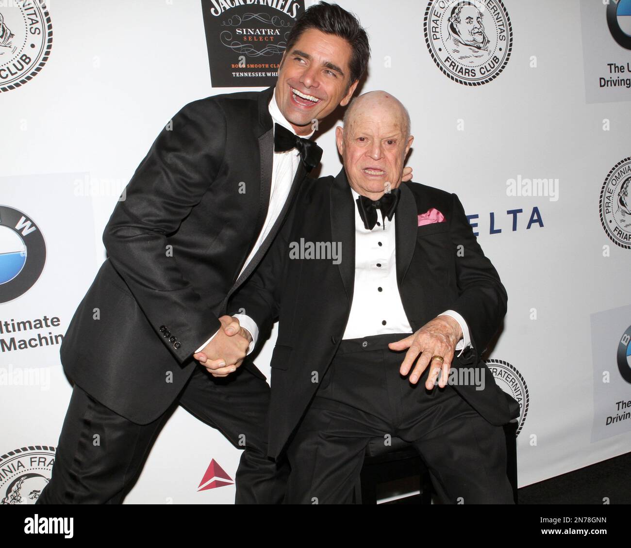 Actor John Stamos and Honoree Don Rickles pose for photos at the Friars