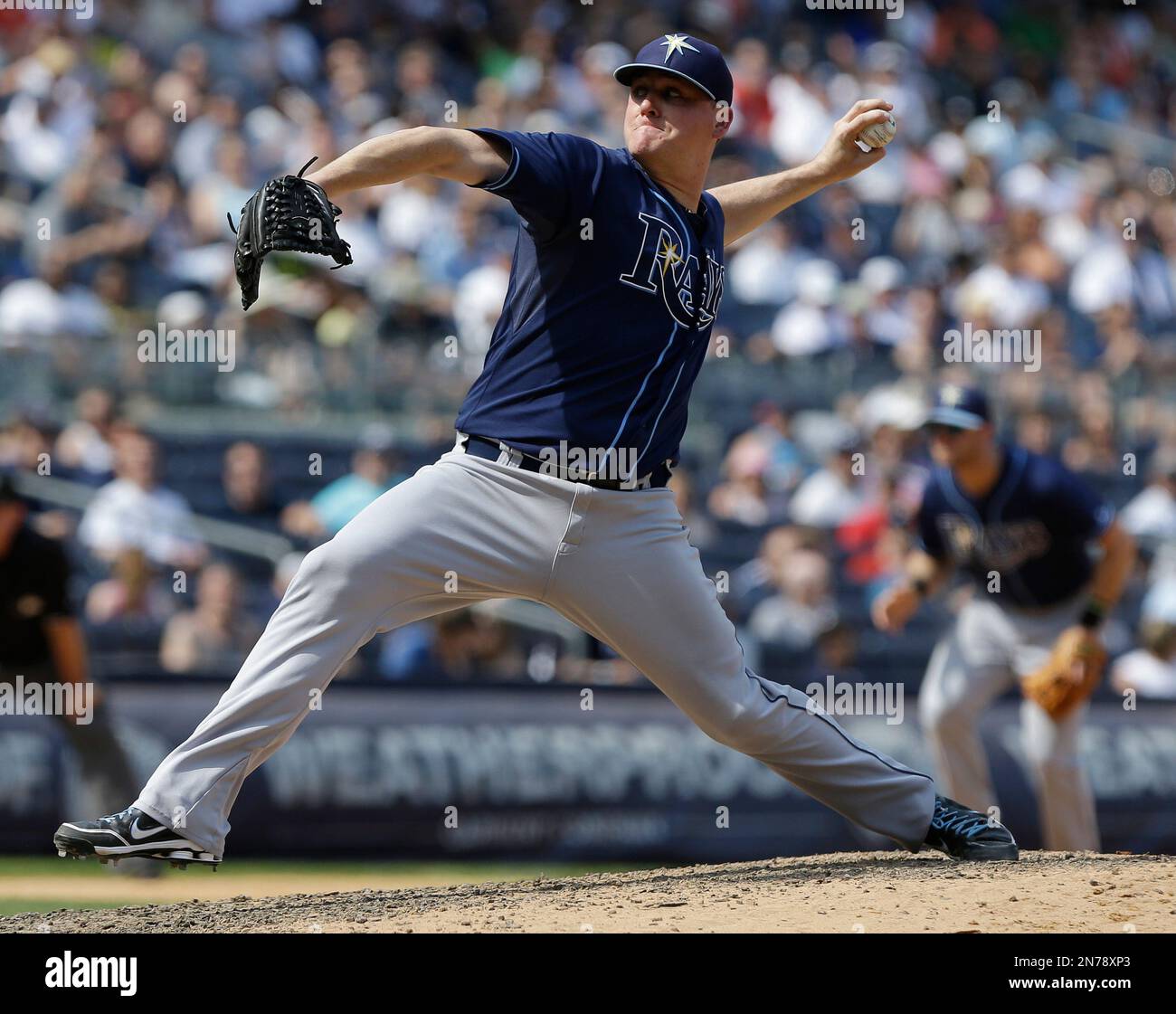 Tampa Bay Rays' Jake McGee (57) delivers a pitch during the