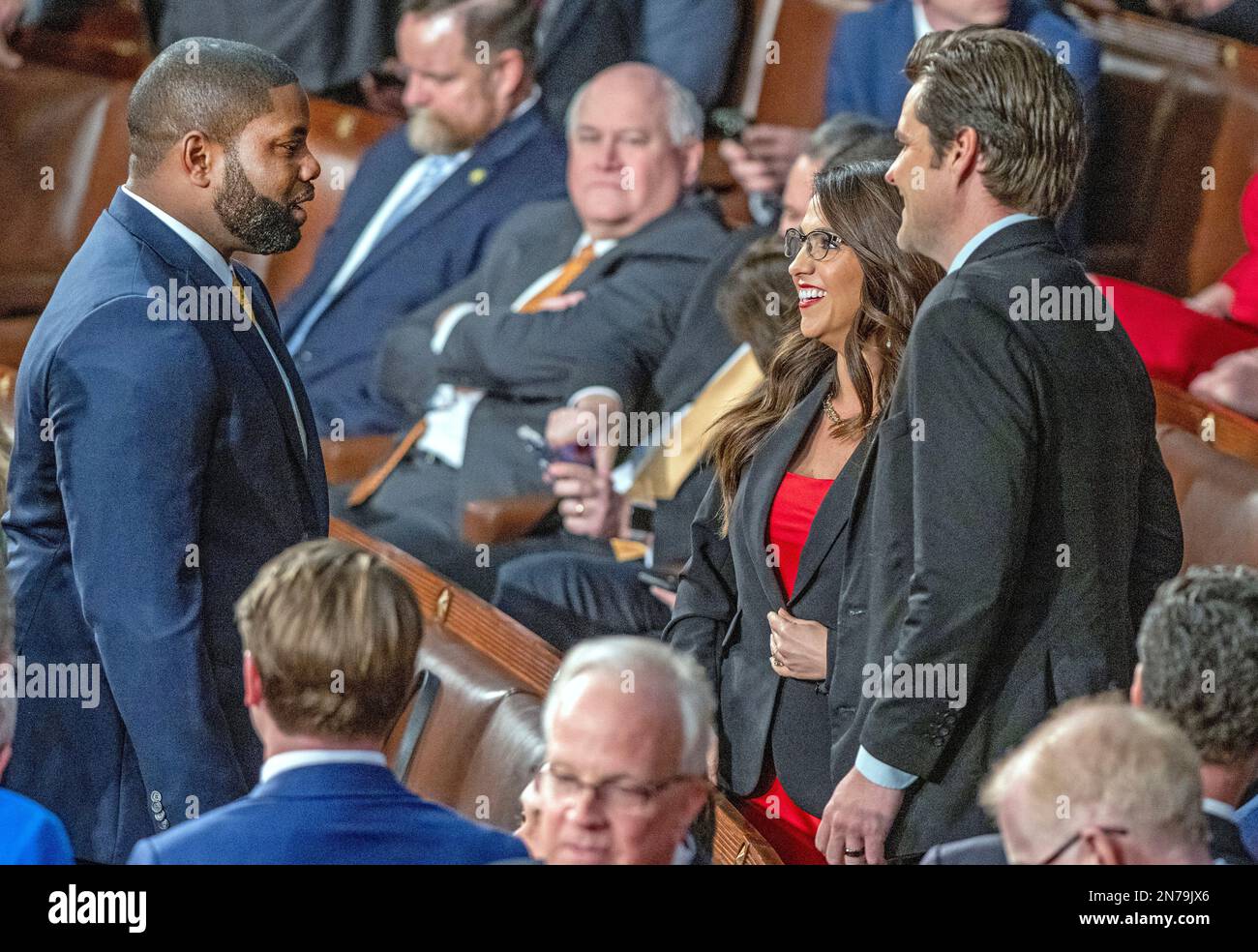 Washington, Vereinigte Staaten. 07th Feb, 2023. United States Representative Byron Donalds (Republican of Florida), left, US Representative Lauren Boebert (Republican of Colorado), center in red, and US Representative Matt Gaetz (Republican of Florida) converse on the floor prior to US President Joe Biden delivering his State of the Union Address to a joint session of the US Congress in the US House Chamber in the US Capitol in Washington, DC on Tuesday, February 7, 2023. Credit: Ron Sachs/CNP/dpa/Alamy Live News Stock Photo