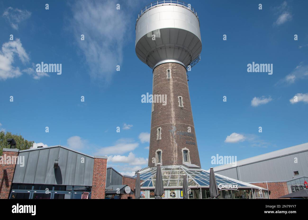 Alsdorf April 2021: The old water tower, Hubertusstraße 13. Now home to the Cineplex Alsdorf: The cinema is located directly at the old water tower. Stock Photo