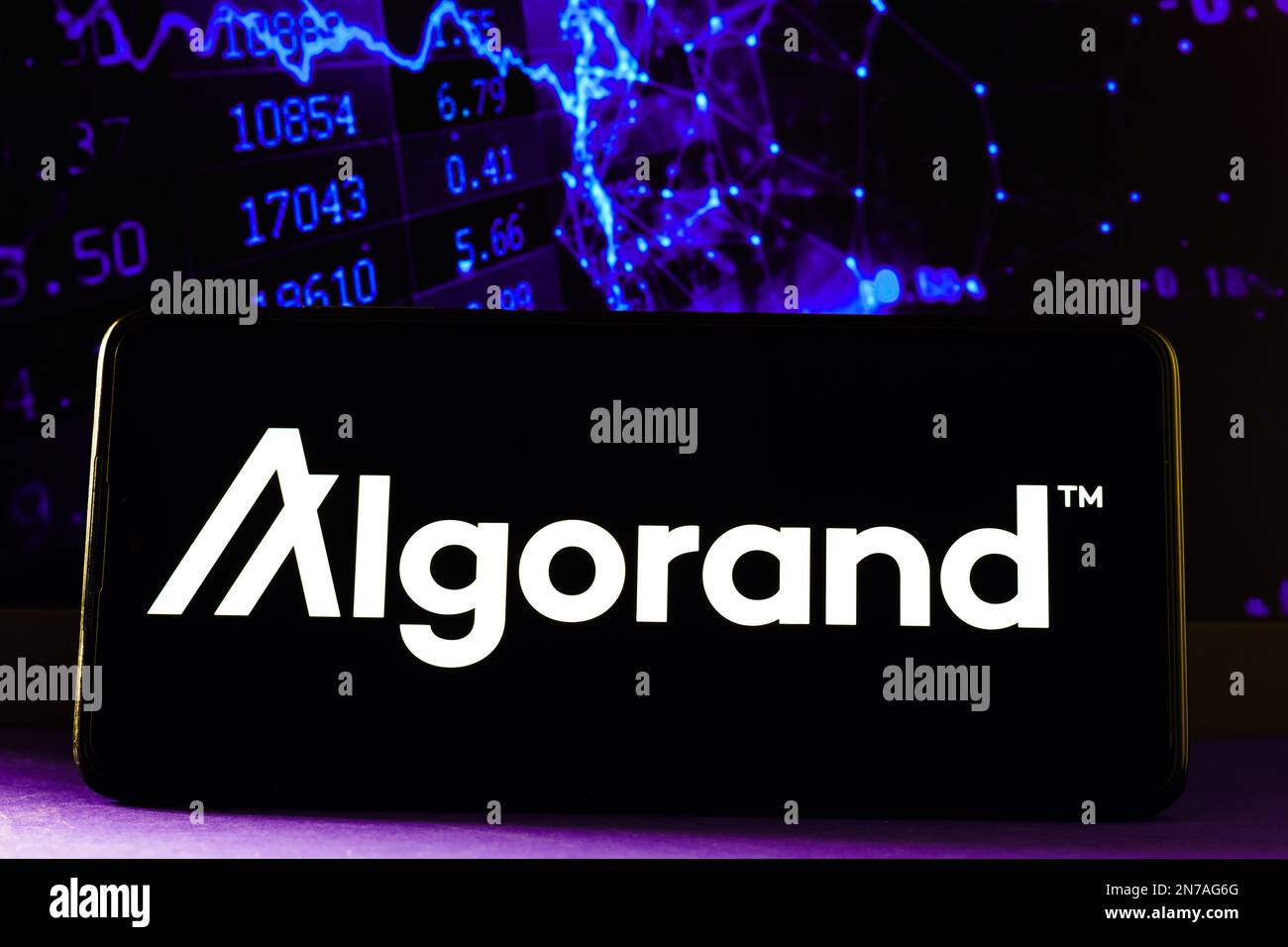 Algorand logo displayed on a phone screen and representation of  cryptocurrency are seen in this illustration photo taken in Krakow, Poland  on November 6, 2021. (Photo by Jakub Porzycki/NurPhoto Stock Photo - Alamy