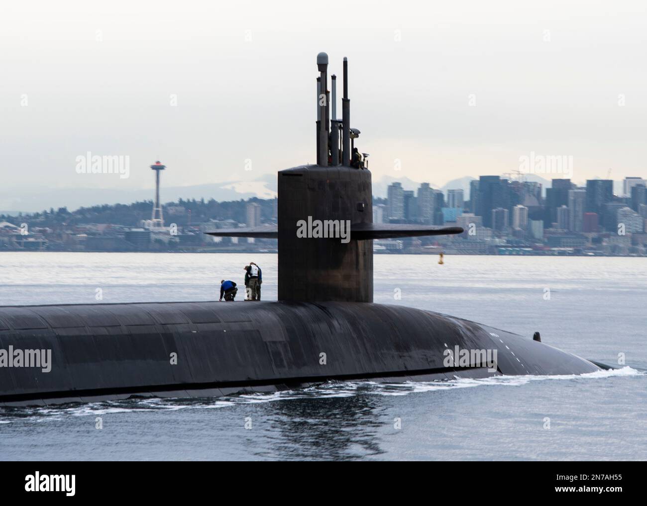 230209-N-ED185-1331  PUGET SOUND, Wash. (Feb. 9, 2023) The Ohio-class ballistic missile submarine USS Louisiana (SSBN 743) transits Puget Sound past the Seattle skyline following a 41-month engineered refueling overhaul at Puget Sound Naval Shipyard and Intermediate Maintenance Facility, February 9, 2023. Louisiana is one of eight ballistic-missile submarines stationed at Naval Base Kitsap-Bangor, providing the most survivable leg of the strategic deterrence triad for the United States. (U.S. Navy photo by Mass Communication Specialist 1st Class Brian G. Reynolds) Stock Photo