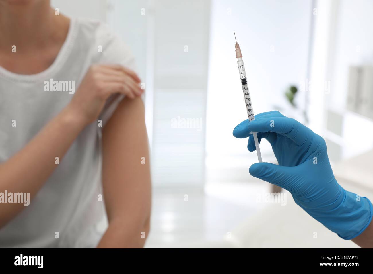 Immunization Injection Doctor giving immunization injection woman hi-res stock photography and ...