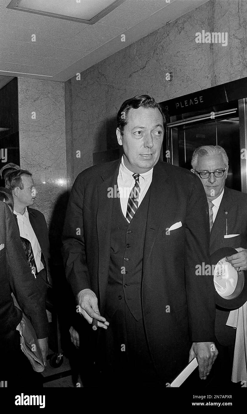 New Orleans District Attorney Jim Garrison, left, is followed by Cecil