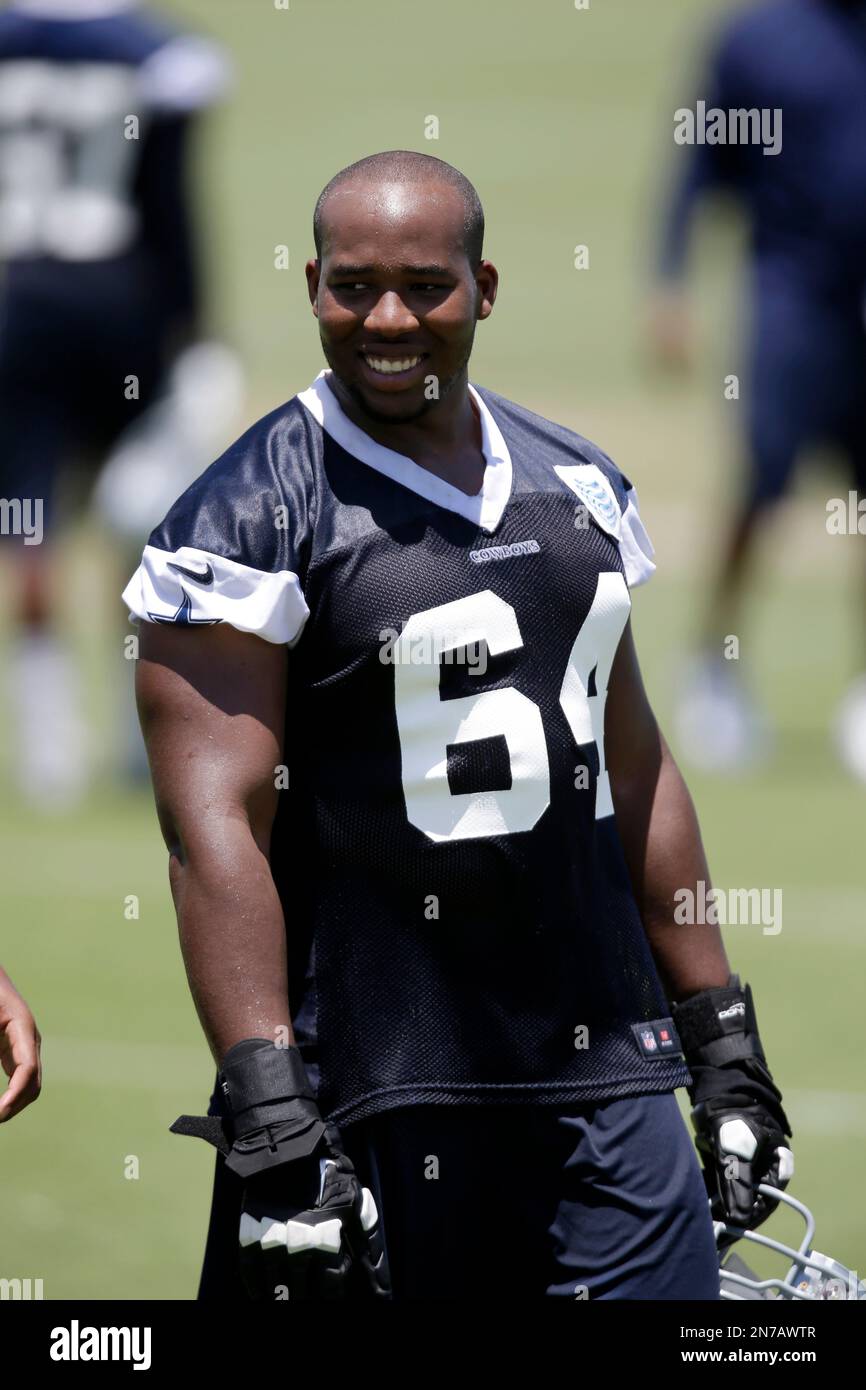 Dallas Cowboys defensive tackle Ikponmwosa Igbinosun (64) walks off the