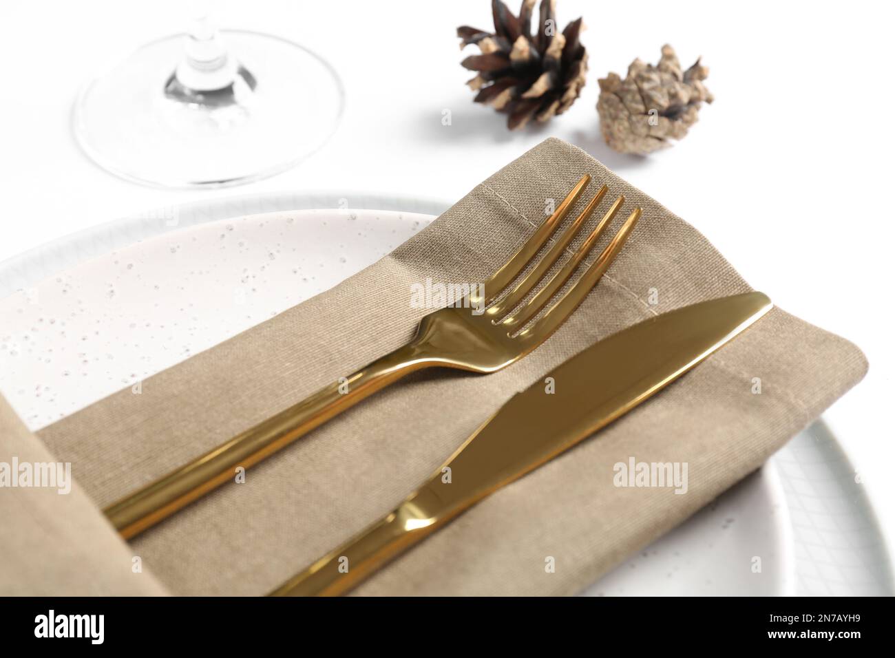 Elegant table setting on white background, closeup Stock Photo - Alamy
