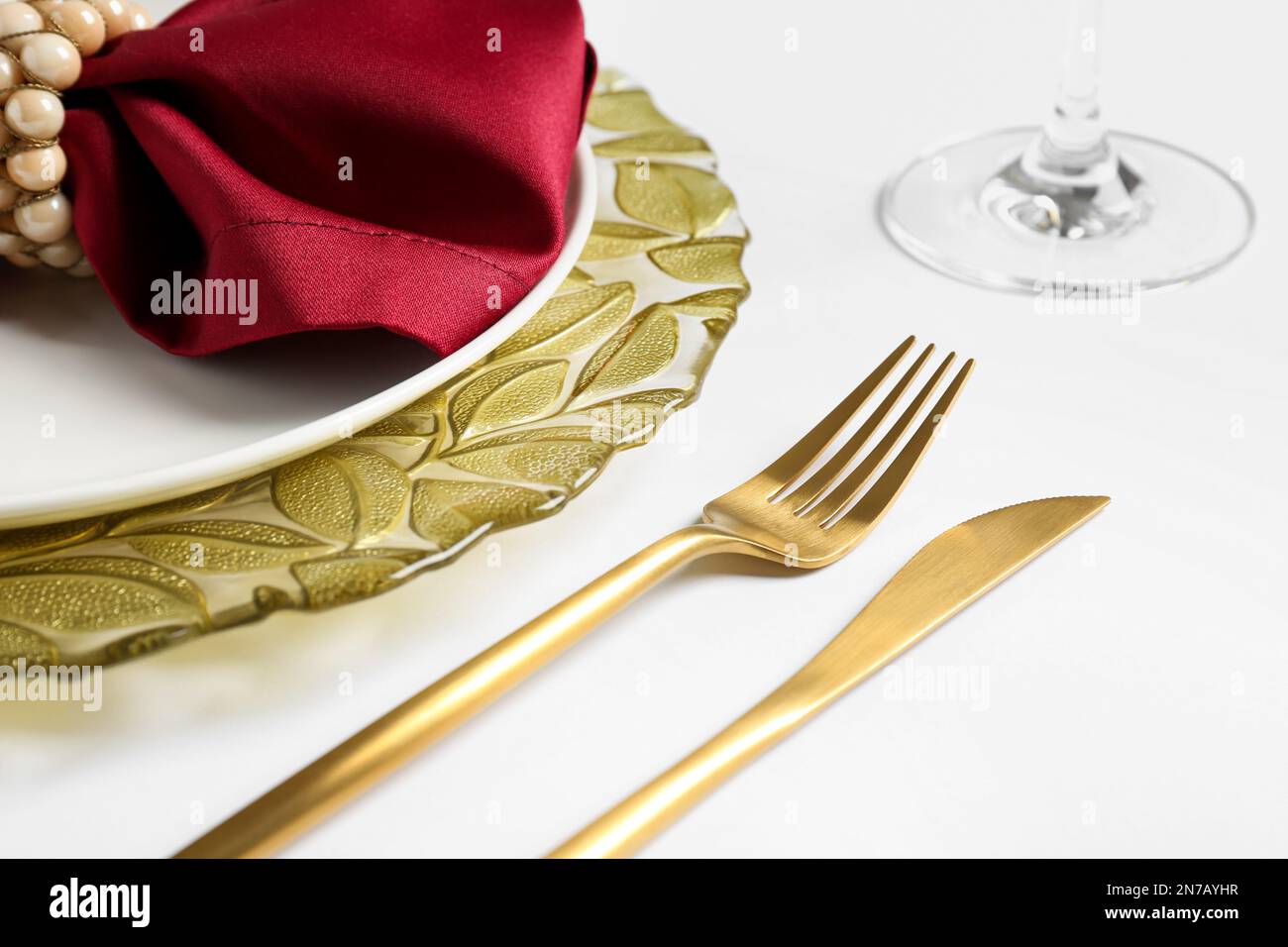 Elegant table setting on white background, closeup Stock Photo - Alamy