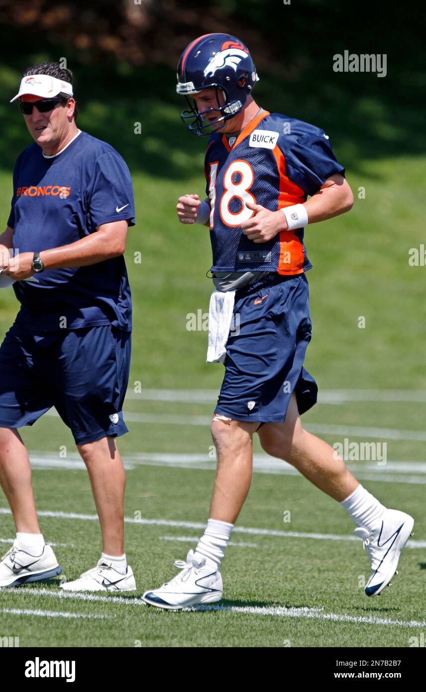 Denver Broncos quarterback Peyton Manning jogs on the field during NFL