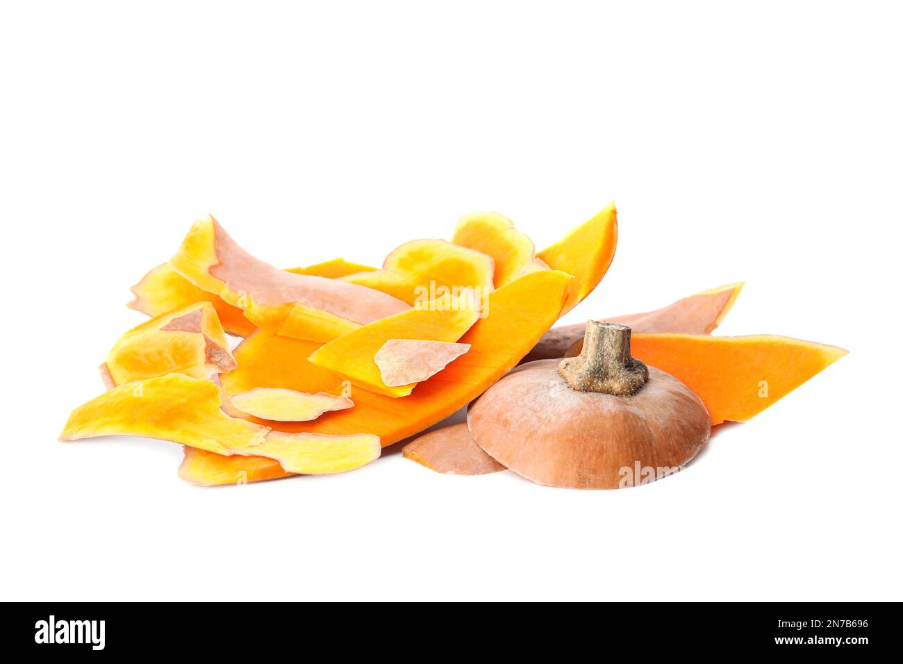 Pumpkin peel on white background. Composting of organic waste Stock